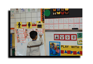 Shaleen writes the number on the number board